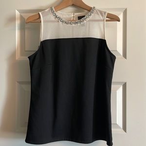 NWT dressy tank top with gorgeous rhinestone detail. Size medium